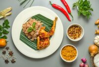 Piring makan dengan komposisi seimbang antara nasi, lauk protein, sayuran hijau, dan buah segar mencerminkan prinsip gizi seimbang yang dianjurkan untuk dikonsumsi setiap hari. Keberagaman warna dalam satu piring bukan hanya soal tampilan, tetapi mencerminkan keragaman nutrisi yang dibutuhkan tubuh untuk bekerja optimal.